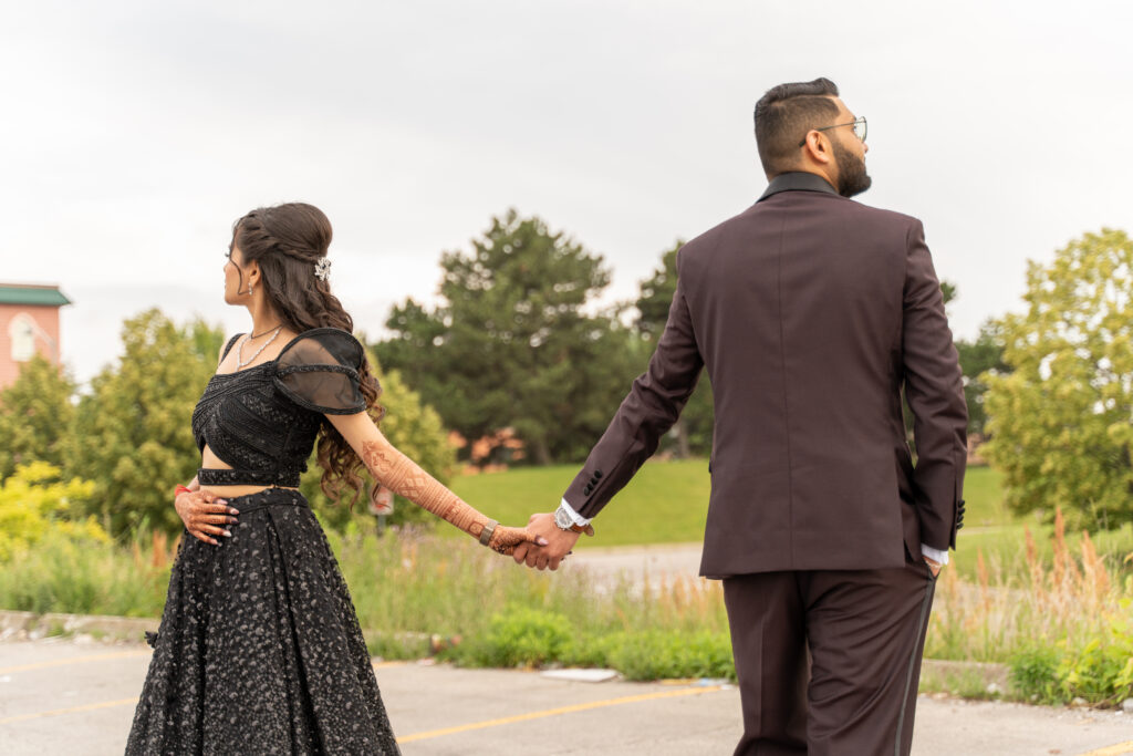 A newlywed couple posing for a wedding portrait