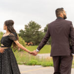 A newlywed couple posing for a wedding portrait